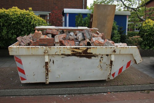 Professional waste clearance team in action in Harefield