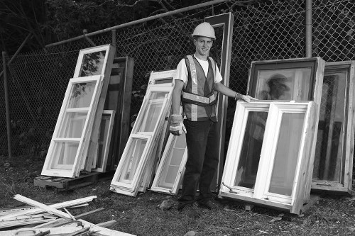 Construction site with waste clearance team in Bow