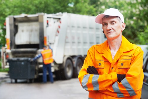 Builders waste clearance truck operating in Limehouse