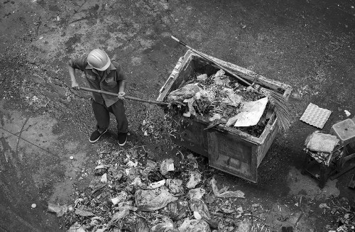 Builders waste clearance truck in Oakleigh Park