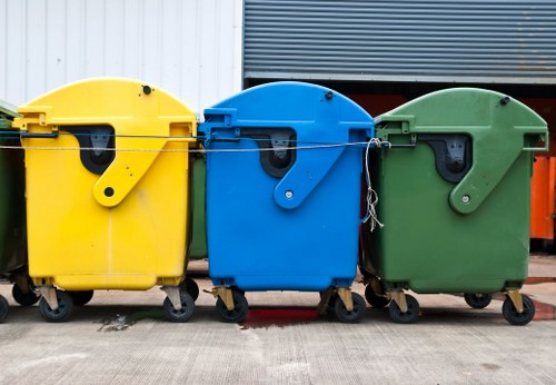 Waste clearance trucks at construction site in Morden