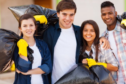 Professional waste clearance team in action at a building site