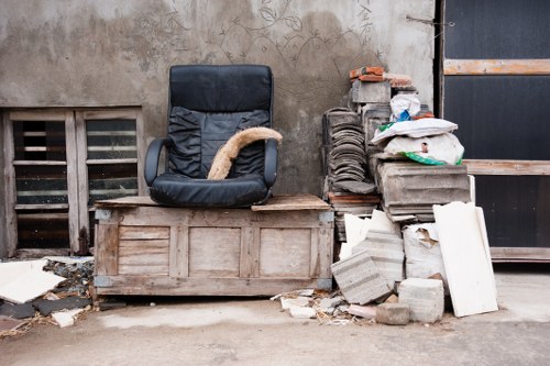 Professional team handling construction waste in Oakleigh Park