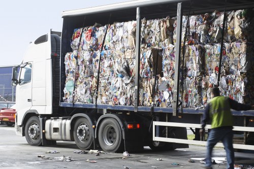 Team sorting construction debris for recycling