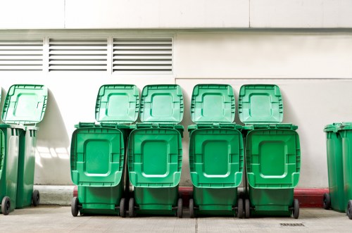 Workers handling recyclable construction debris