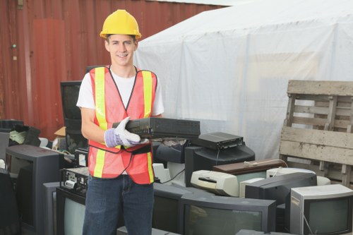 Professional team assessing waste clearance at a construction site