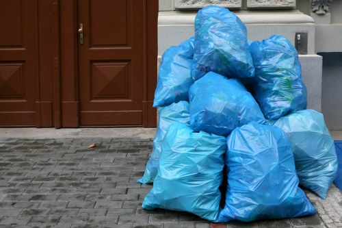 Waste removal truck in Harlesden streets