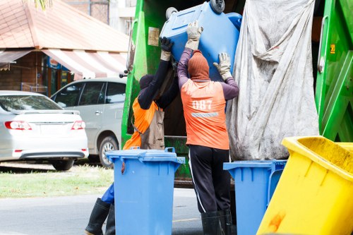 Waste clearance truck operating at a Maze Hill site