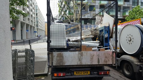 Professional waste clearance truck at work