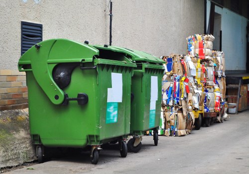 Workers sorting construction waste for recycling