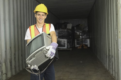 Waste clearance vehicle at a construction site