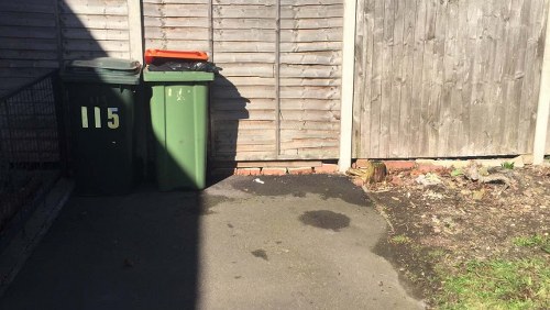 Professional waste clearance workers at a construction site