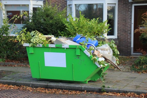 Professional team managing builders waste clearance in an urban setting